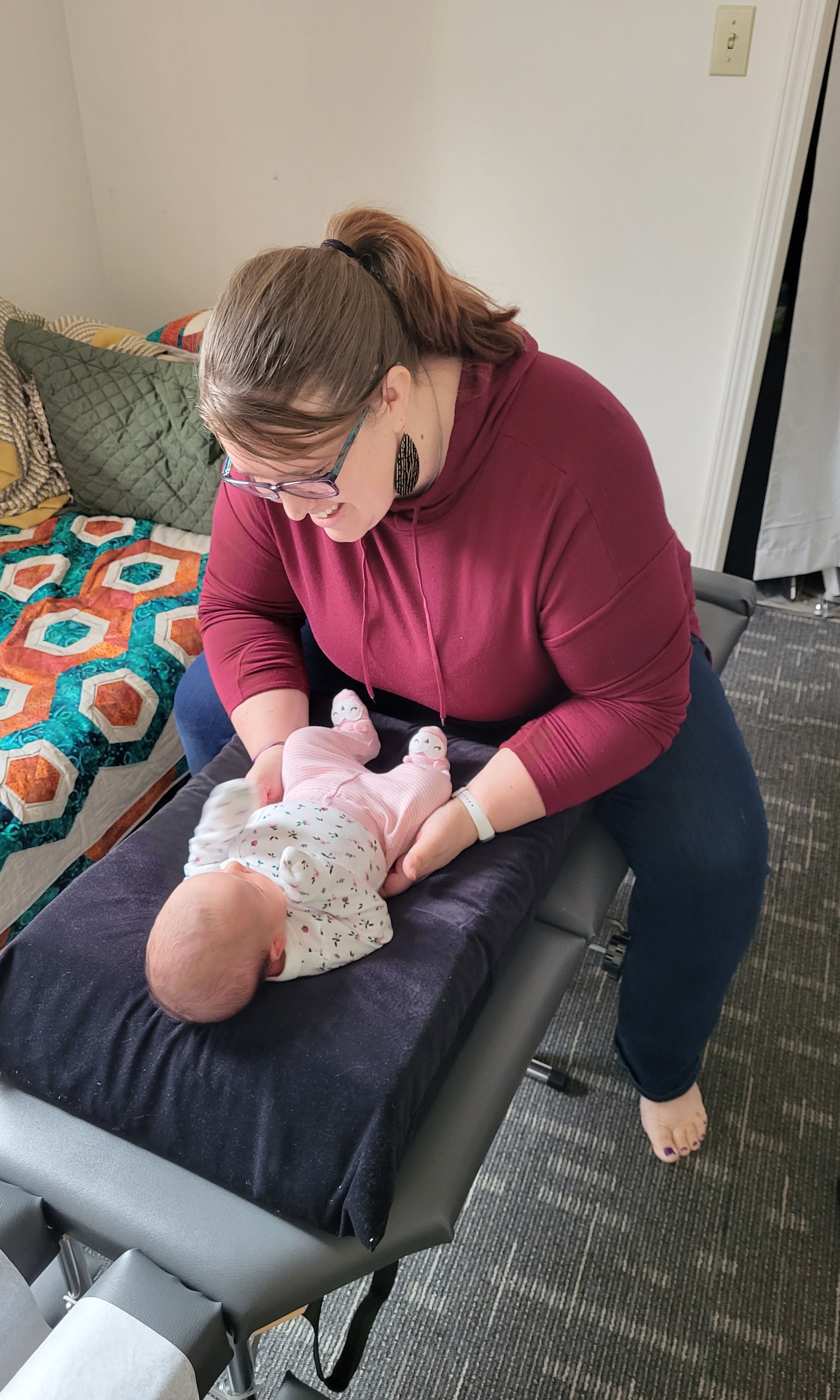 Dr. Becker providing chiropractic care to a young patient